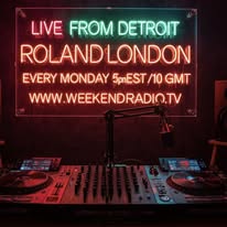 Roland London's WK-END Radio studio in Detroit with mixing console and neon broadcast sign